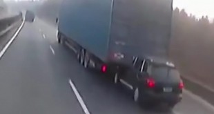 Kamion kilometrima nesvesno vukao Porsche Cayenne [Video]